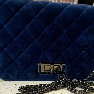 Velvet crossed body handbag